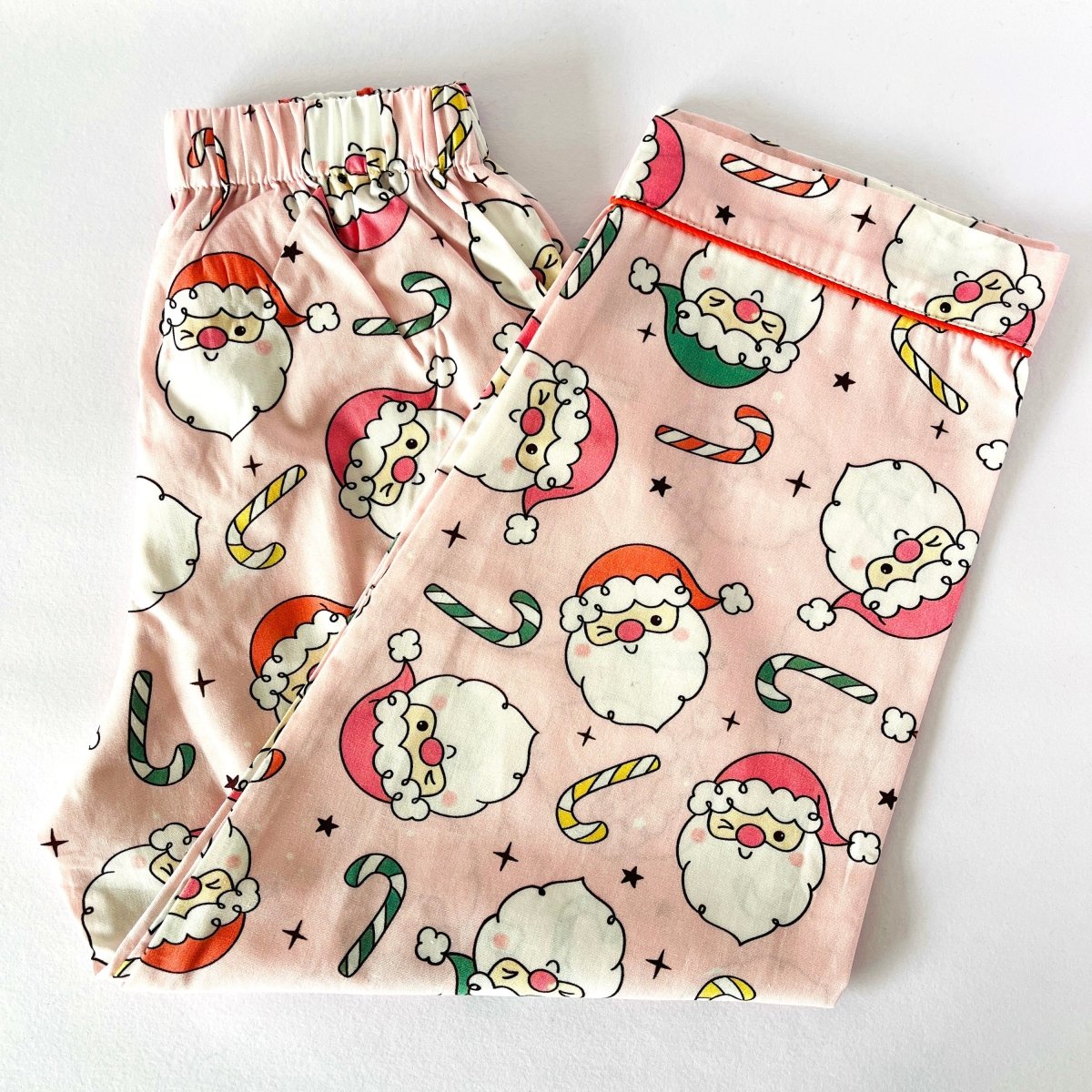 Pink Winking Santa Pyjamas